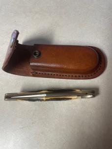 Vintage Schrade USA 127UH folding knife and leather sheath