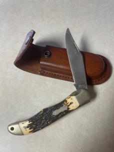 Vintage Schrade USA 127UH folding knife and leather sheath