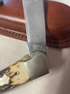 Vintage Schrade USA 127UH folding knife and leather sheath