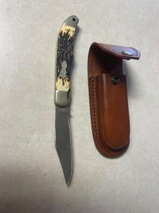 Vintage Schrade USA 127UH folding knife and leather sheath
