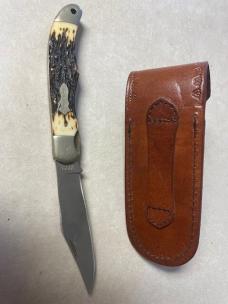 Vintage Schrade USA 127UH folding knife and leather sheath