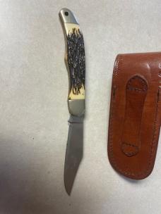 Vintage Schrade USA 127UH folding knife and leather sheath