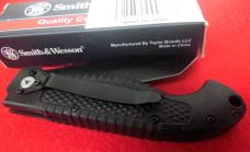 UNUSED FROM A FEW YEARS BACK IN BOX FLIP OPEN SMITH & WESSON TACTICAL 4-3/4" BLACK SCALES GOOD EDGE