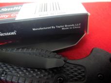 UNUSED FROM A FEW YEARS BACK IN BOX FLIP OPEN SMITH & WESSON TACTICAL 4-3/4" BLACK SCALES GOOD EDGE