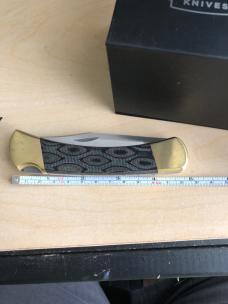 Buck 110 Folding Hunter with Magnacut Blade and Python Micarta Scales 