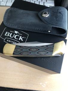 Buck 110 Folding Hunter with Magnacut Blade and Python Micarta Scales 
