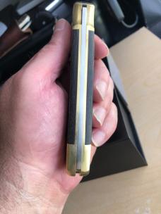 Buck 110 Folding Hunter with Magnacut Blade and Python Micarta Scales 