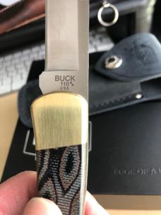 Buck 110 Folding Hunter with Magnacut Blade and Python Micarta Scales 