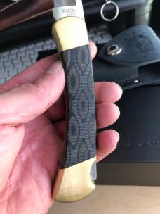 Buck 110 Folding Hunter with Magnacut Blade and Python Micarta Scales 