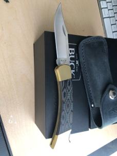 Buck 110 Folding Hunter with Magnacut Blade and Python Micarta Scales 