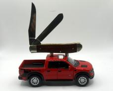CASE XX 2025 DARK RED BURLAP ICARTA SMOOTH MINI TRAPPER WITH DIE CAST FORD RAPTOR DISPLAY TRUCK