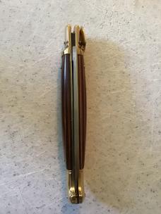 24cm, 9 3/8in, birdshead, auto, brass, handle seem to be a colorful plywood