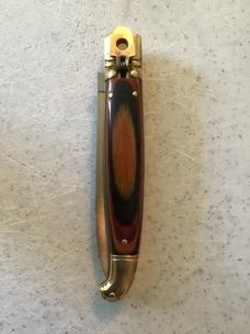 24cm, 9 3/8in, birdshead, auto, brass, handle seem to be a colorful plywood
