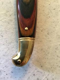 24cm, 9 3/8in, birdshead, auto, brass, handle seem to be a colorful plywood
