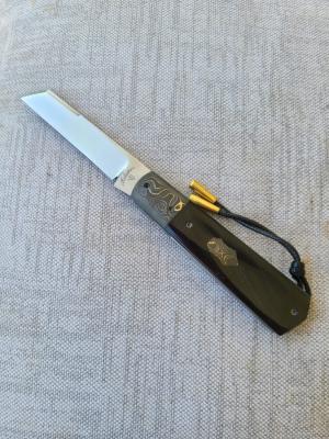 Vincenzo Balistreri Buffalo Horn White WolfFools Gold shield beadFileworkJiimpingCoaSlip