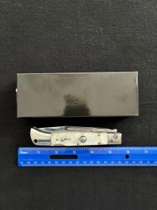 White Swirl Pearlite Lock-back 11 inch Swing Guard Automatic Knife