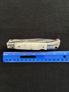 White Swirl Pearlite Lock-back 11 inch Swing Guard Automatic Knife