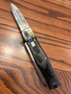 Unusual Double Sided Dual Speed Switchblade