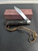 Flylock 5" automatic hunter and fish scaling knife from Bridgeport Connecticut, used.