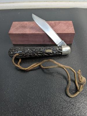 Flylock 5" automatic hunter and fish scaling knife from Bridgeport Connecticut, used.