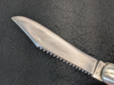 Flylock 5" automatic hunter and fish scaling knife from Bridgeport Connecticut, used.