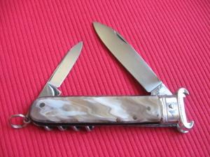 VINTAGE ROSA V. MANIAGO INOX STAMPED ITALIAN MANUAL SHELL PULLER KNIFE