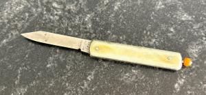 Remington Pull Ball Switchblade Knife, Cream Color Scale, Used