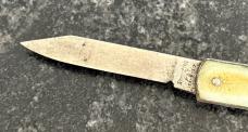 Remington Pull Ball Switchblade Knife, Cream Color Scale, Used