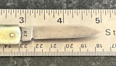 Remington Pull Ball Switchblade Knife, Cream Color Scale, Used