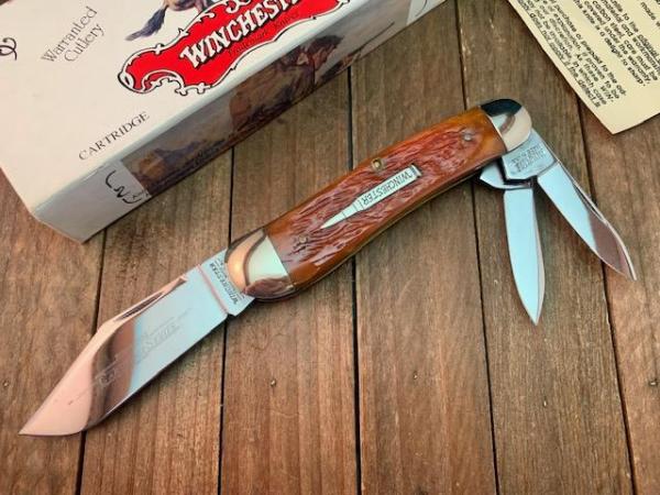 Winchester Split Backspring Whittler Cartridge Series Burnt Orange Winchester Jigged Bone 1997 Winchester Split Backspring Whittler Cartridge Series Burnt Orange Winchester Jigged Bone 1997