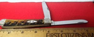 CASE XX 2022 4quot 6254 ANTIQUE SMOOTH BONE TRAPPER WITH ELK SCENE SCROLLED BOLSTERS UNUSED