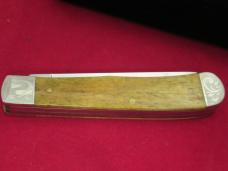 Case XX 2004 Bone Trapper Scrolled Bolsters with Eagle Etch on Handle