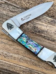 BUCK 110 ** BRIAN YELLOWHORSE CUSTOM ARROWHEAD MOTHER OF PEARL ABALONE FOLDING HUNTER