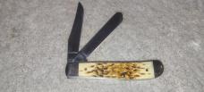 2007- 6207 Case XX Mini Trapper with Amber Bone Handles 