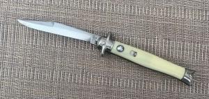 C. 1948-50 SHUR-SNAP COLONIAL YELLOW FISHTAIL AUTOMATIC KNIFE