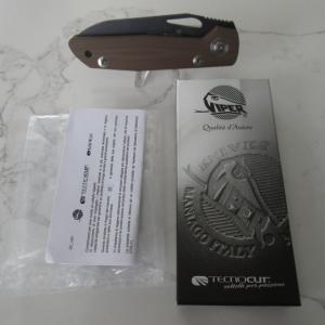 This is the Viper Cutlery Free, has Brown G10 handles and the steel is D2.  