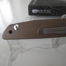 This is the Viper Cutlery Free, has Brown G10 handles and the steel is D2.  