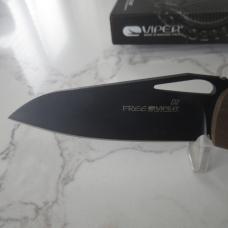 This is the Viper Cutlery Free, has Brown G10 handles and the steel is D2.  
