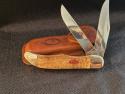 Case Black Bone Folding Hunter Knife red shield, new in sheath 2007,