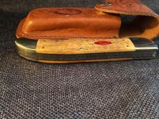 Case Black Bone Folding Hunter Knife red shield, new in sheath 2007,