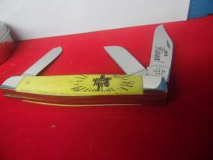 CASE XX 2014 USA YELLOW STOCKMAN "HE IS RISEN" IN TIN IS UNUSED