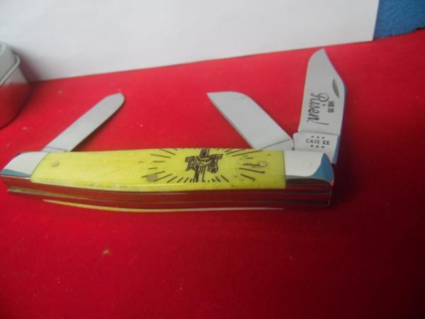 CASE XX 2014 USA YELLOW STOCKMAN "HE IS RISEN" IN TIN IS UNUSED CASE XX 2014 USA YELLOW STOCKMAN "HE IS RISEN" IN TIN IS UNUSED