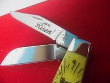 CASE XX 2014 USA YELLOW STOCKMAN "HE IS RISEN" IN TIN IS UNUSED
