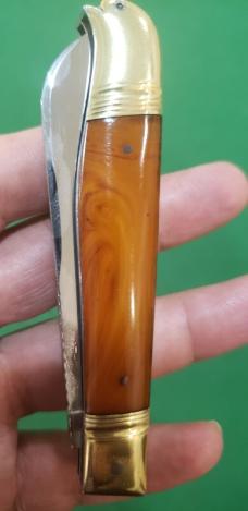4 1/8" Custom Made Bird's Head Bolster Trapper, Amber Handled with nice file work