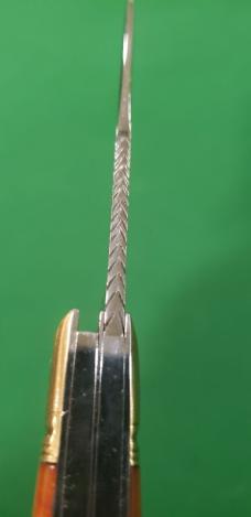 4 1/8" Custom Made Bird's Head Bolster Trapper, Amber Handled with nice file work