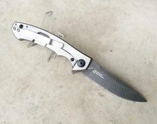 Zero Tolerance 0450CFDAMS Flipper Knife Orange & Red Marbled Multi Carbon Fiber Damascus Blade - New