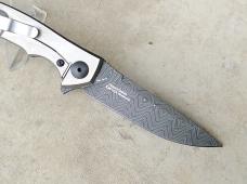 Zero Tolerance 0450CFDAMS Flipper Knife Orange & Red Marbled Multi Carbon Fiber Damascus Blade - New