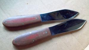 A pair of Vintage Case XX 303 Throwing Knives 