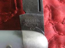 Tiny ULSTER 2 blade pen knife with pearl scales. Lightly sharpened.