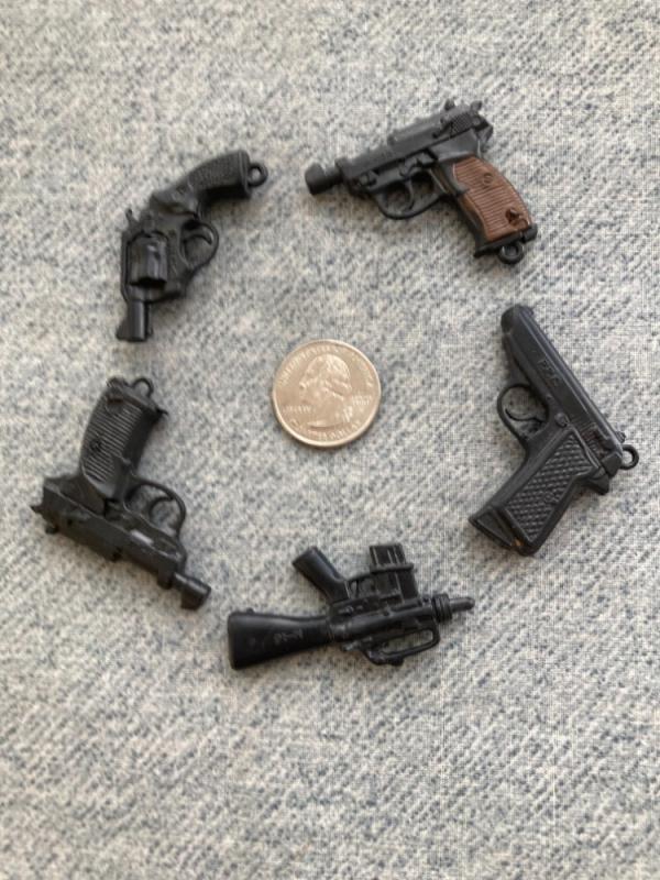 Vintage (5) Miniature, Tootsie-Toy Style, Key Chain Guns: Examples: P.P.K., P-.38, M-16, SPL-.44 Vintage (5) Miniature, Tootsie-Toy Style, Key Chain Guns: Examples: P.P.K., P-.38, M-16, SPL-.44